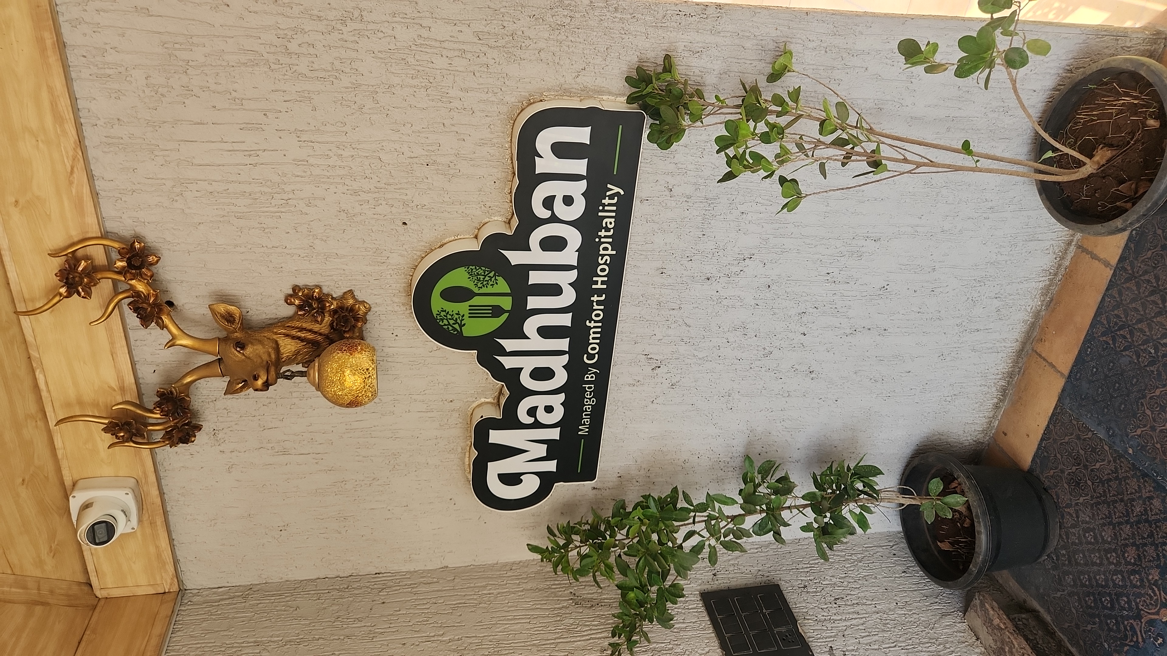 Madhuban entrance signage